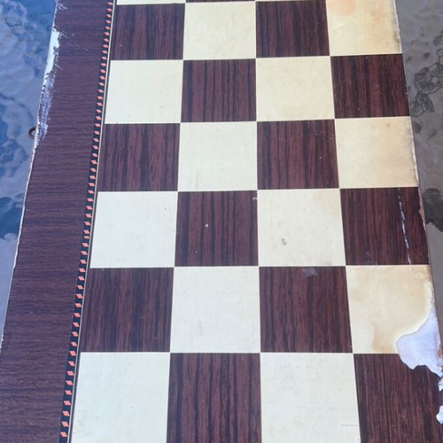 Wooden backgammon used with visible wear