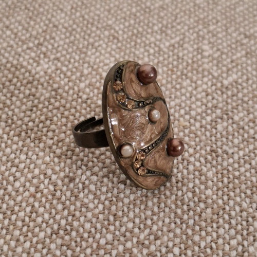 Elongated ring used, brown