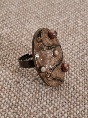 Elongated ring used, brown