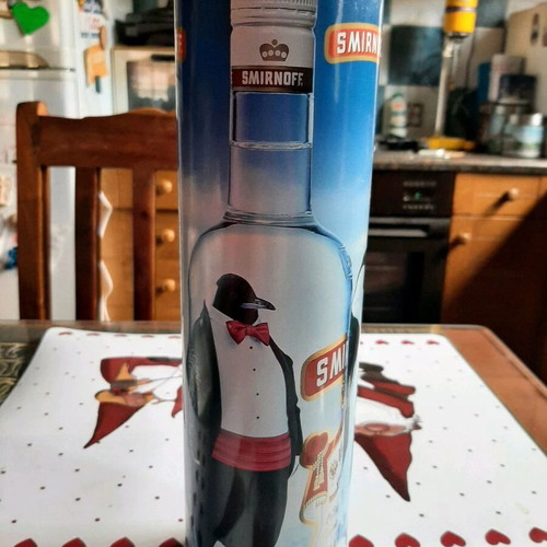Smirnoff collectible tin and Ursus Rotter red bottle used