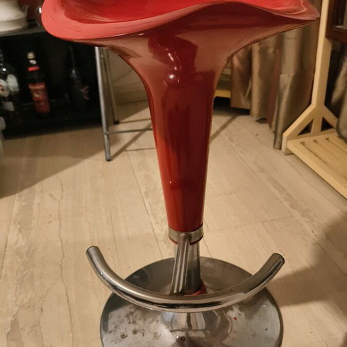 Red stool used, does not adjust height