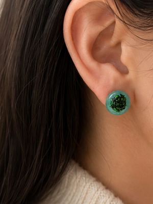 Handmade mint green resin earrings with dark green flakes