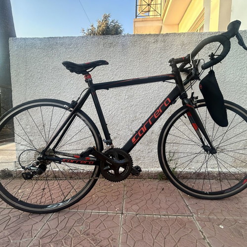 Road bike Carrera Vituoso 26 inch wheel size like new with extra cleats and gel cover