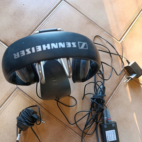 Sennheiser wireless headphones with transmitter base for TV like new