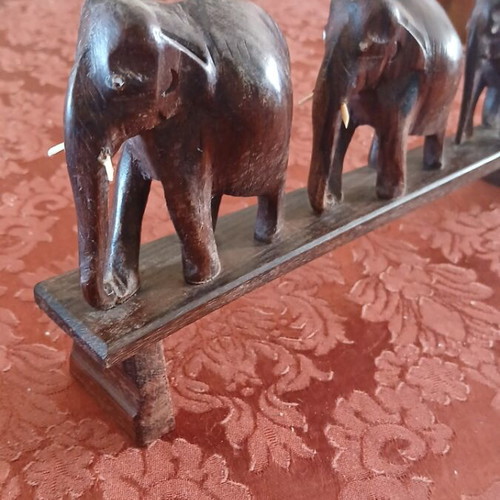 Wooden elephant set on base, like new, three sizes, handmade