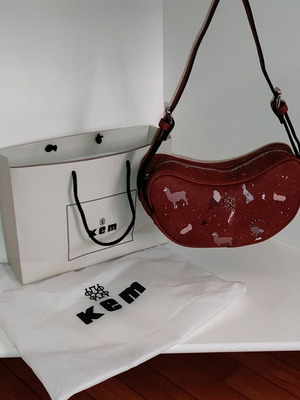 Kem crossbody bag brown new with animal designs and zipper