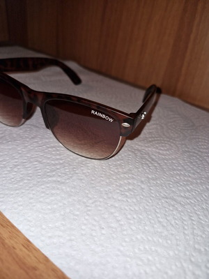 Sunglasses used, brown