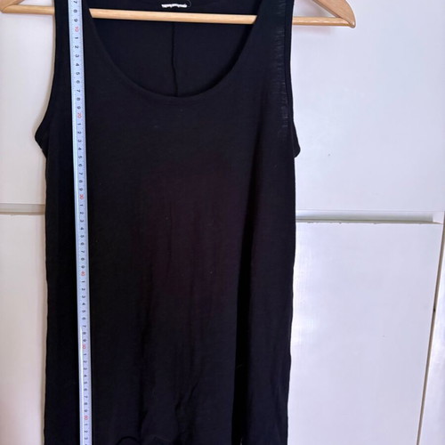 Black women's sleeveless top with asymmetric hem Medium like new