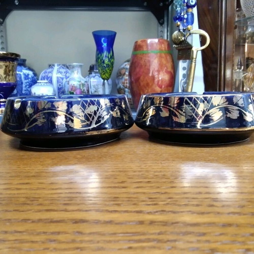 Porcelain ashtrays set like new, 2 pieces with gilded details