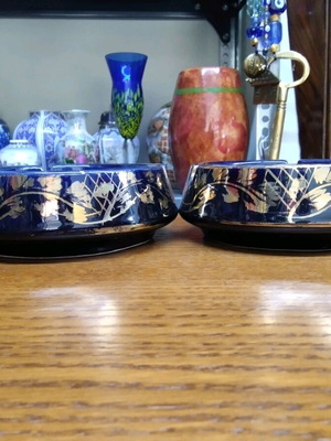 Porcelain ashtrays set like new, 2 pieces with gilded details