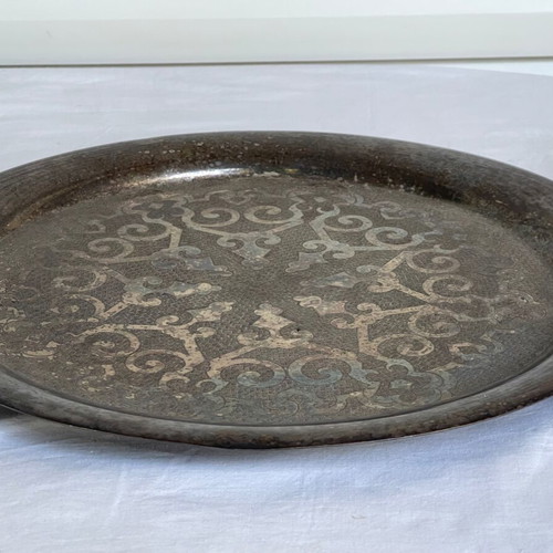 Large serving tray used with Arabic design and patina