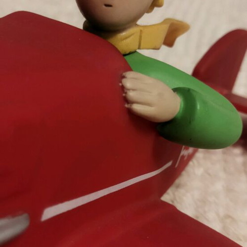 Le Petit Prince figure decorative like new with red airplane