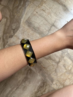 Bracelet iron with beads like new, black and yellow