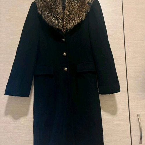 Black coat like new with fur collar and back slit