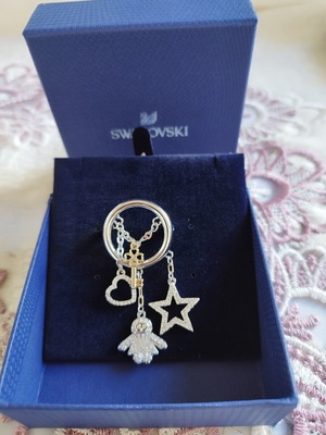 Swarovski collectible vintage brooch with crystals, used