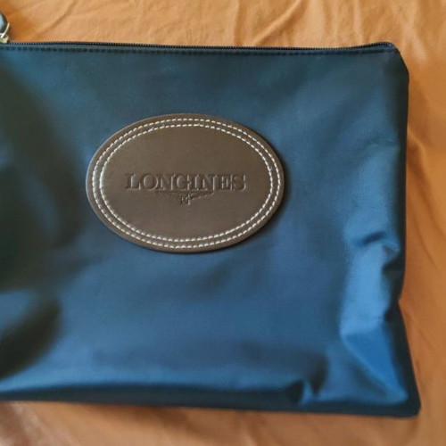 Longines purse used handheld 100% original