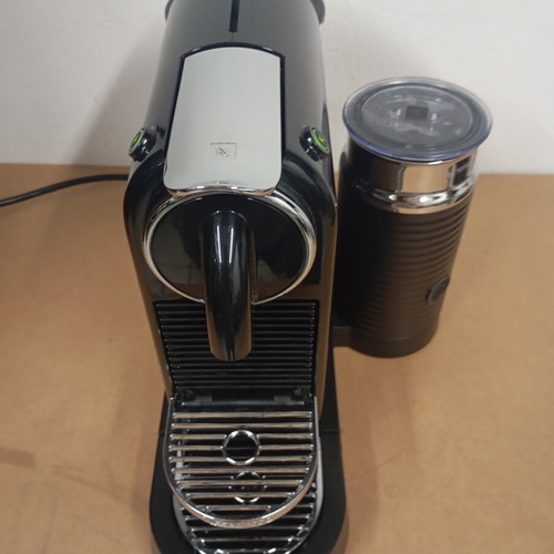 Delonghi Nespresso coffee machine with milk frother