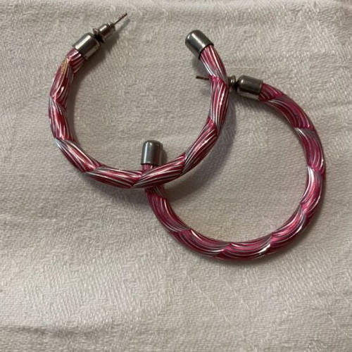 Hoop earrings like new with pink and silver embossed design