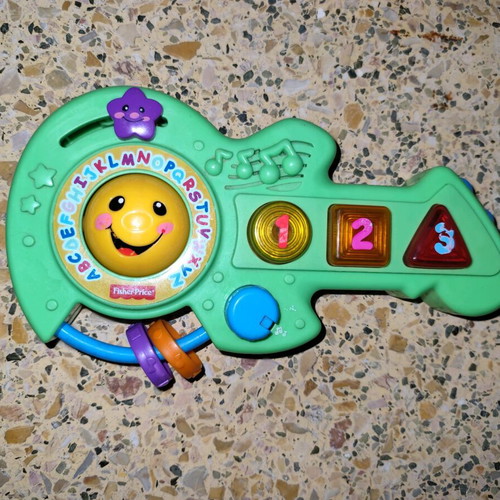 Fisher Price musical guitar used with English songs