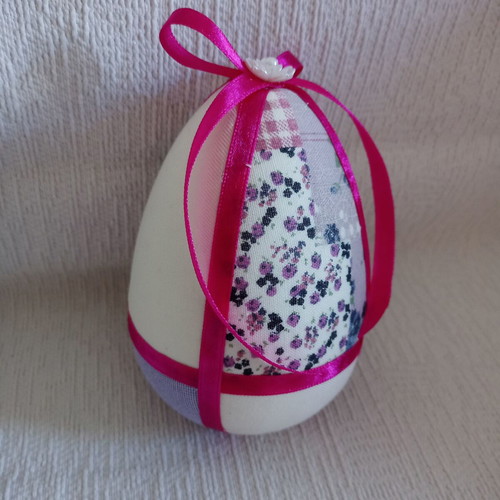Decorative egg lilac fuchsia floral used
