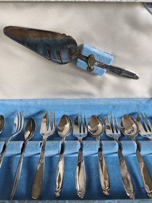 Vintage set of forks and dessert spoons like new, Geoman Plate 1950