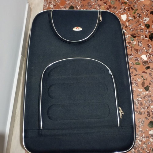 Lumi travel suitcase used with broken wheels