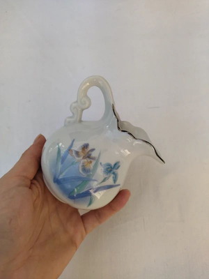 Porcelain vintage milk jug with floral design like new