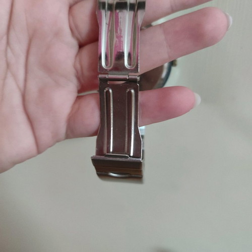 Wristwatch used with silver bracelet and rhinestone design