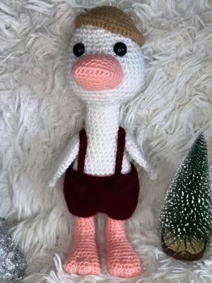 Handmade knitted duck with beige hat and burgundy overalls new