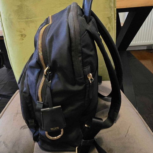 Tumi backpack used, black with gold details