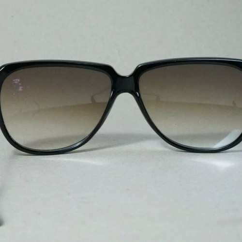 Italian Luxottica 8589 sunglasses used, black and brown