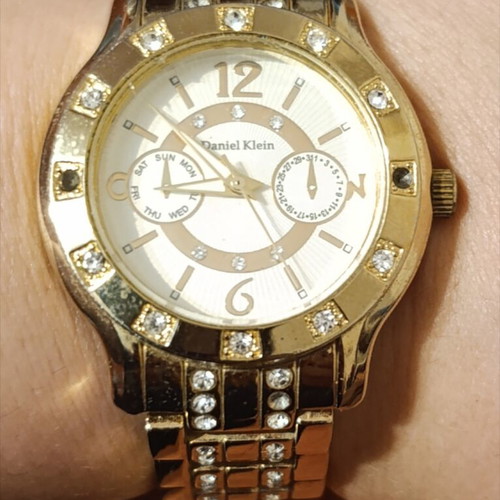 Daniel Klein wristwatch like new, gold bracelet, women's