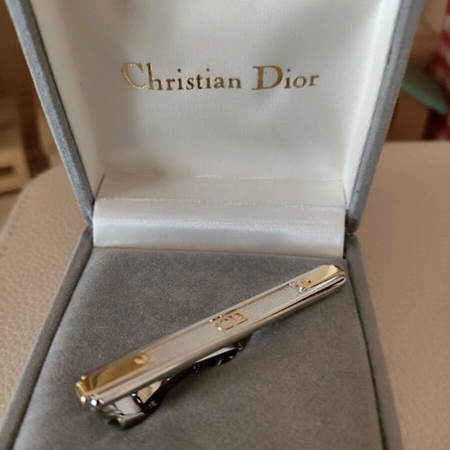 Authentic Dior tie pin new, silver with gold details