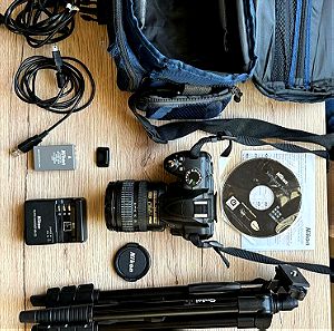 Nikon D3000 Φωτογραφική μηχανή με τρίποδο και αξεσουάρ. (S.C: 7.799)