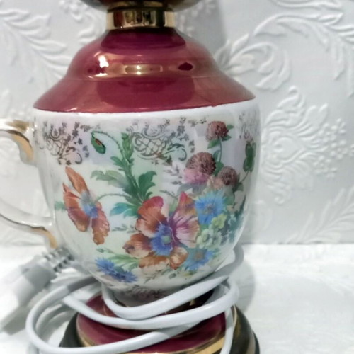 Electric ceramic vintage lamp used with floral decoration