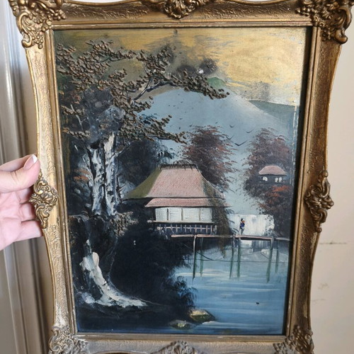 Vintage oil painting of Asian landscape like new with embossed details and gold carved frame