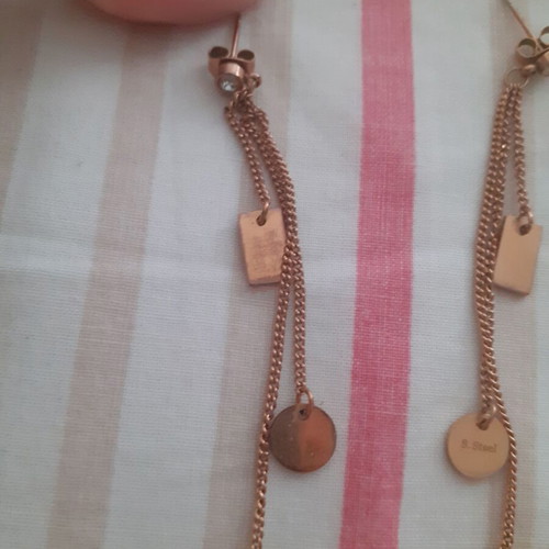 Triple hanging earrings made of steel in gold color like new