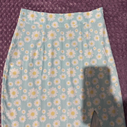 Mini skirt with daisies on blue background, size S, like new