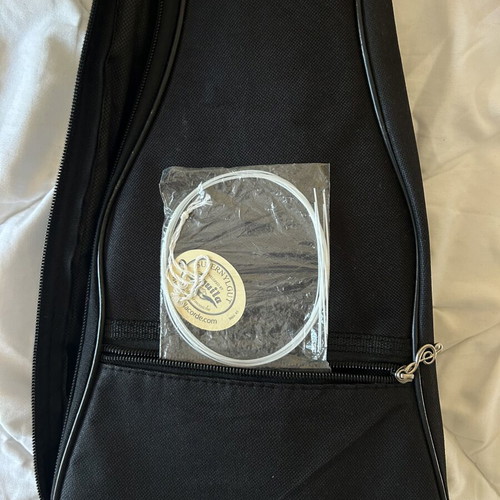 Ukulele like new with torn bag