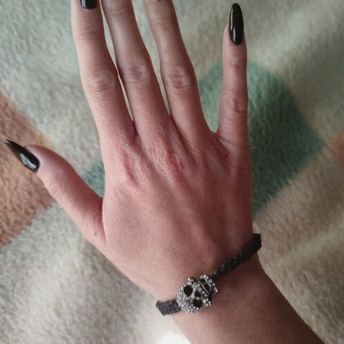 Bracelet with skull charm and strass like new, black