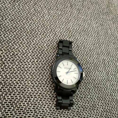 FCUK wristwatch new with changing display