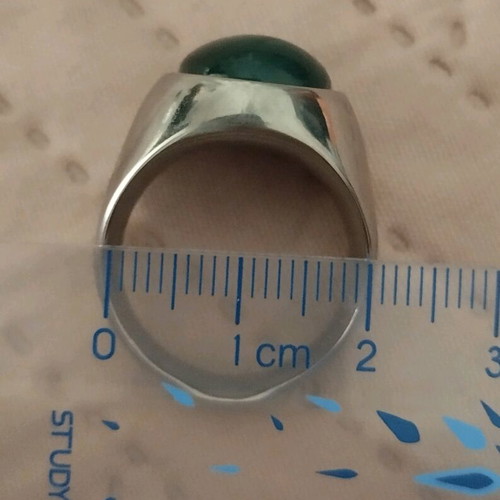 Steel ring with green stone like new