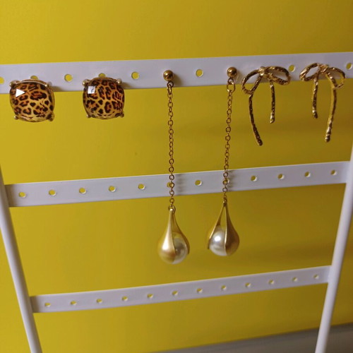 Earrings like new, set of 3 with silicone clasp