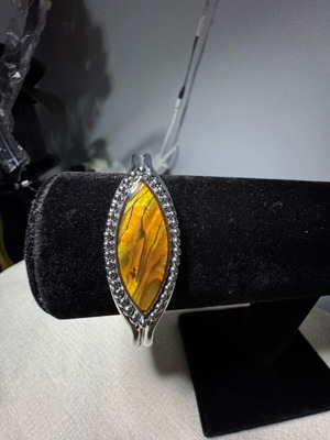 Adjustable bracelet like new, orange and silver