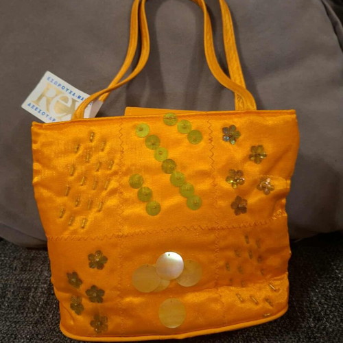 Orange handheld bag embroidered with beads and sequins new with tag