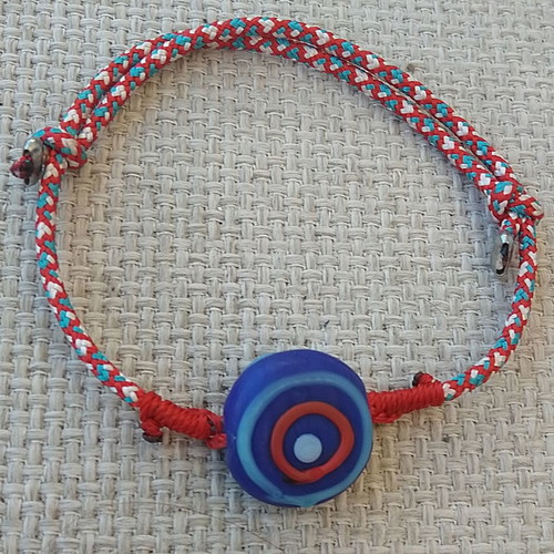 Martis bracelet handmade with cord and polymer clay eye made to order