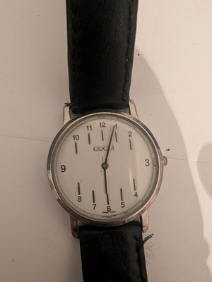 Gucci vintage women's wristwatch, stainless steel, black leather strap
