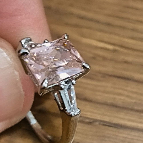 Ring with pink rectangular zircon and silver plating