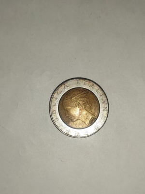 500 Lire coin used from Italy with Braille embossing