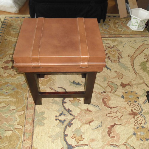 Leather folding table used with suitcase-shaped storage space